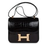PRE-OWNED HERMÈS CONSTANCE 24 BLACK SHINY ALLIGATOR ROSE GOLD HARDWARE