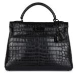 PRE-OWNED HERMÈS KELLY RETOURNE 32 SO BLACK MATTE NILOTICUS CROCODILE BLACK HARDWARE