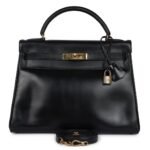 VINTAGE HERMÈS KELLY RETOURNE 32 BLACK BOX GOLD HARDWARE