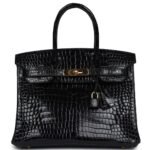 PRE-OWNED HERMÈS BIRKIN 30 BLACK SHINY POROSUS CROCODILE GOLD HARDWARE