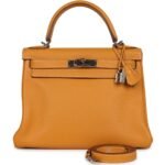 PRE-OWNED HERMÈS KELLY RETOURNE 28 MOUTARDE CLEMENCE PALLADIUM HARDWARE