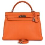 PRE-OWNED HERMÈS KELLY RETOURNE 32 ORANGE TOGO PALLADIUM HARDWARE