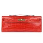HERMÈS KELLY CUT ORANGE POPPY SHINY POROSUS CROCODILE GOLD HARDWARE