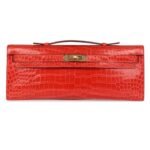 HERMÈS KELLY CUT ORANGE POPPY SHINY POROSUS CROCODILE GOLD HARDWARE