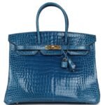 PRE-OWNED HERMÈS BIRKIN 35 BLEU MYKONOS SHINY POROSUS CROCODILE GOLD HARDWARE