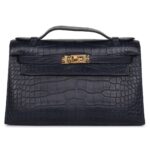 HERMÈS KELLY POCHETTE BLEU INDIGO MATTE ALLIGATOR GOLD HARDWARE
