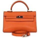 PRE-OWNED HERMÈS MICRO KELLY 15 ORANGE SWIFT PALLADIUM HARDWARE