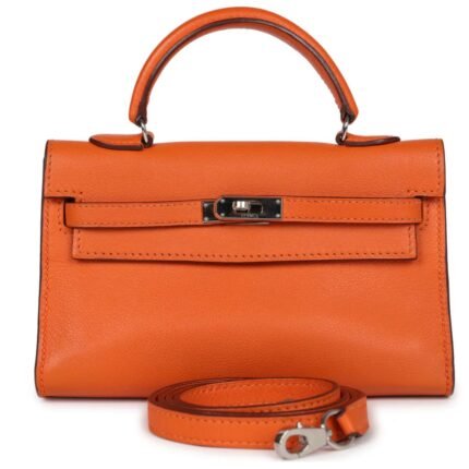 PRE-OWNED HERMÈS MICRO KELLY 15 ORANGE SWIFT PALLADIUM HARDWARE
