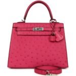 PRE-OWNED HERMÈS KELLY SELLIER 25 ROSE TYRIEN OSTRICH PALLADIUM HARDWARE