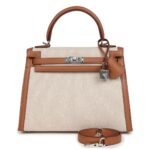 HERMÈS KELLY SELLIER 25 GOLD SWIFT AND ECRU TOILE PALLADIUM HARDWARE