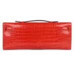 HERMÈS KELLY CUT ORANGE POPPY SHINY POROSUS CROCODILE GOLD HARDWARE