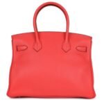PRE-OWNED HERMÈS BIRKIN 25 ROUGE TOMATE SWIFT GOLD HARDWARE