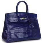 PRE-OWNED HERMÈS BIRKIN 35 BLEU ELECTRIC SHINY POROSUS CROCODILE PALLADIUM HARDWARE