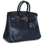 PRE-OWNED HERMÈS BIRKIN 25 BLEU DE MALTE VARANUS NILOTICUS LIZARD GOLD HARDWARE