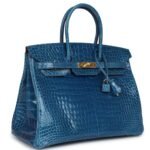 PRE-OWNED HERMÈS BIRKIN 35 BLEU MYKONOS SHINY POROSUS CROCODILE GOLD HARDWARE