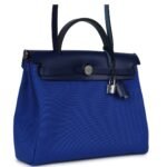 HERMÈS HERBAG ZIP PM 31 BLEU BILL TOILE MILITAIRE CANVAS AND BLEU SAPHIR VACHE HUNTER PALLADIUM HARDWARE