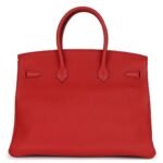 PRE-OWNED HERMÈS BIRKIN 35 ROUGE TOMATE TOGO GOLD HARDWARE