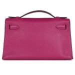 PRE-OWNED HERMÈS KELLY POCHETTE ROSE POURPRE SWIFT PALLADIUM HARDWARE