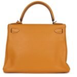 PRE-OWNED HERMÈS KELLY RETOURNE 28 MOUTARDE CLEMENCE PALLADIUM HARDWARE