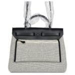 HERMÈS HERBAG ZIP 31 PM HOBNAILED BLACK AND ECRU PRINTED H PLUME CANVAS AND VACHE HUNTER PALLADIUM HARDWARE