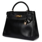 VINTAGE HERMÈS KELLY RETOURNE 32 BLACK BOX GOLD HARDWARE