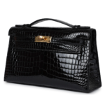 HERMÈS KELLY POCHETTE BLACK SHINY POROSUS CROCODILE GOLD HARDWARE