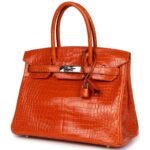 PRE-OWNED HERMÈS BIRKIN 30 ORANGE SHINY POROSUS CROCODILE PALLADIUM HARDWARE