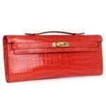 HERMÈS KELLY CUT ORANGE POPPY SHINY POROSUS CROCODILE GOLD HARDWARE