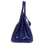 PRE-OWNED HERMÈS BIRKIN 35 BLEU ELECTRIC SHINY POROSUS CROCODILE PALLADIUM HARDWARE