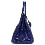 PRE-OWNED HERMÈS BIRKIN 35 BLEU ELECTRIC SHINY POROSUS CROCODILE PALLADIUM HARDWARE