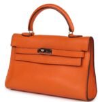 PRE-OWNED HERMÈS MICRO KELLY 15 ORANGE SWIFT PALLADIUM HARDWARE