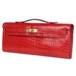 HERMÈS KELLY CUT BOUGAINVILLEA SHINY POROSUS CROCODILE GOLD HARDWARE