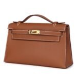 HERMÈS KELLY POCHETTE GOLD SWIFT GOLD HARDWARE