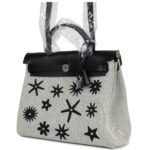 HERMÈS HERBAG ZIP 31 PM HOBNAILED BLACK AND ECRU PRINTED H PLUME CANVAS AND VACHE HUNTER PALLADIUM HARDWARE