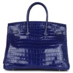 PRE-OWNED HERMÈS BIRKIN 35 BLEU ELECTRIC SHINY POROSUS CROCODILE PALLADIUM HARDWARE