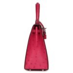 PRE-OWNED HERMÈS KELLY SELLIER 25 ROSE TYRIEN OSTRICH PALLADIUM HARDWARE