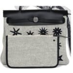 HERMÈS HERBAG ZIP 31 PM HOBNAILED BLACK AND ECRU PRINTED H PLUME CANVAS AND VACHE HUNTER PALLADIUM HARDWARE