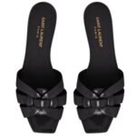 SAINT LAURENT TRIBUTE MULES IN PATENT LEATHER