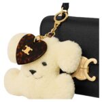 CELINE TRIOMPHE POM POM KEYRING WITH HEART IN SHEARLING AND ACETATE WITH GOLD FINISHING