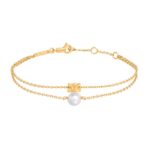 CELINE LES PERLES BRACELET IN RESIN PEARL AND BRASS WITH GOLD FINISH