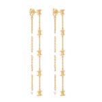 CELINE LES PERLES LONG EARRINGS IN BRASS WITH GOLD FINISH AND RESIN PEARLS
