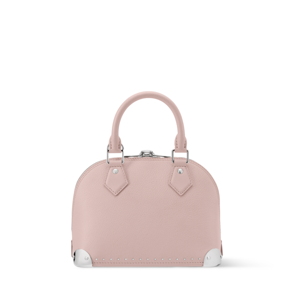 Louis Vuitton Alma Trunk BB Bag featuring a structured silhouette, signature trunk-inspired details, leather trim, gold-tone hardware, and a detachable shoulder strap.